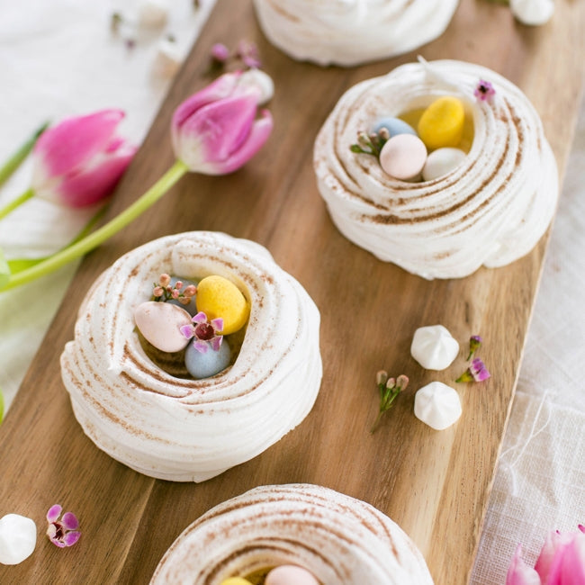 Honey meringues with chocolate eggs in the middle