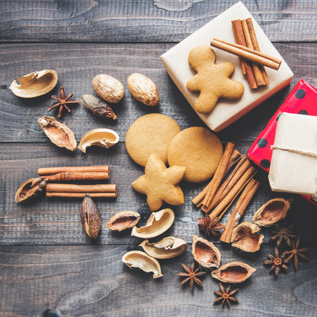 Gingerbread cookies, cinnamon sticks, and nut shells 