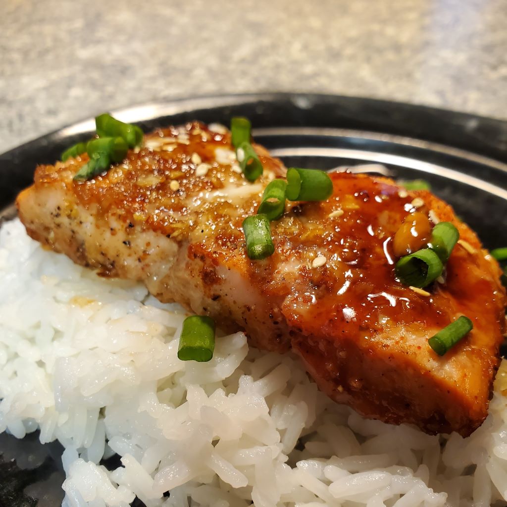Hot honey glazed trout on rice